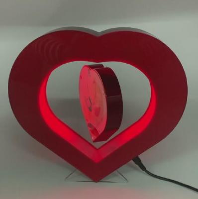 China heart shape christmas gift led light magnetic levitation floating photo frame display rack for gift and decor for sale