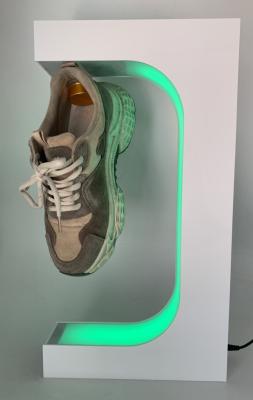 China 360 rotating led light change magnetic levitation sneaker shoes display racks for sale