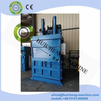 China Hydraulic driven recycling vertical baler equipment /vertical waste paper plastic film/ vertical cardboard baler for sale