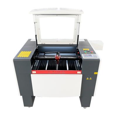 China Small Water Cooled CO2 Laser Engraving Cutting Machine Laser Cutter Engraver Engraving For Wood for sale