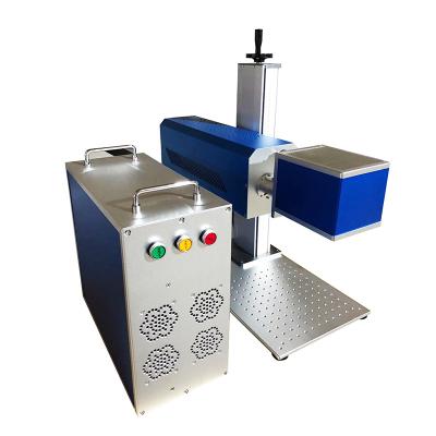 China Air Cooled 30W 35W 40W 50W Fiber Laser CO2 Laser Marking Machine For Online Metal Or Bottles Production for sale