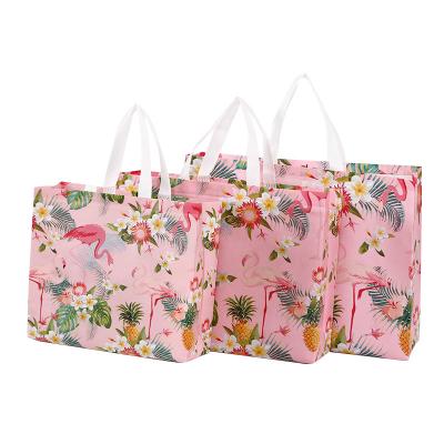 China Recyclable Factory Thickened Advertising Gift Bag Customized Tote Bag Flamingo Coated Non Woven Garment Woven Garment Bag for sale