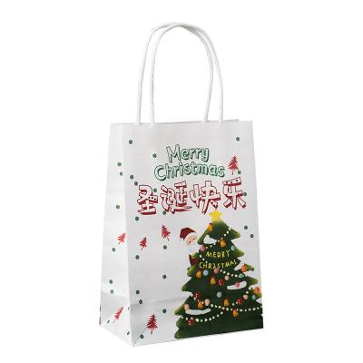 China Stock Creative Portable Christmas Paper Packaging Materials Manufacturers Recycled Christmas Gift Paper Bag Customized Paper Tote Bag for sale