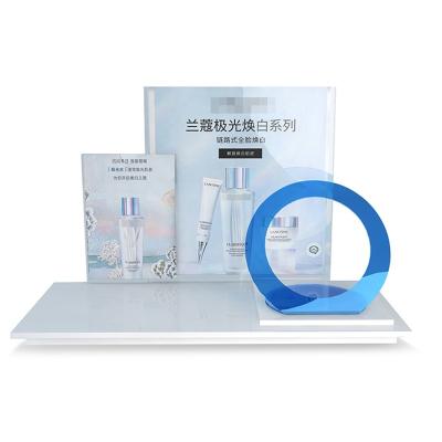 China Morden Double layered poster cosmetic acrylic display rack, beauty instrument display rack, skincare product display cabinet display for sale