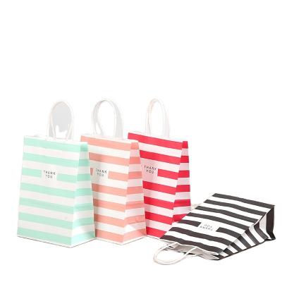 China Custom Uber Logo Red White Stripes Handled Bags Glue Sealer Gift Wrapping Clothes Paper Bag for sale