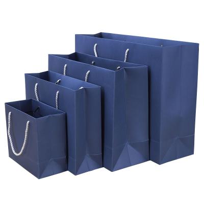 China Reusable Paper Gloss Laminated Packaging Clothes Bag Wash Paper Factory Bag Shopping Bag for sale