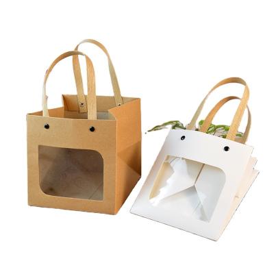 China Customized Large White Cardboard Handled With PP Handle Shopping Tote Window PVC Paper Bag for sale