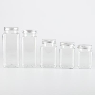 China Tall Plastic Clear Square Food Snack Jars With Aluminum Lids 565ml 700ml for sale