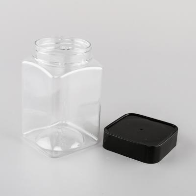 China Empty Square Plastic Food Storage Jars With Black Colored Lids For Snacks Nut Cookies for sale