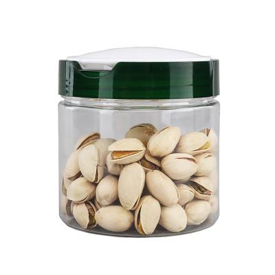 China Plastic Transparent Food Box Bottles With Flip Caps Clear Tin Can For Nut Storage for sale