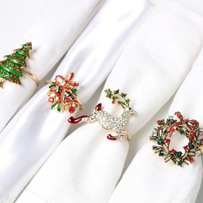 China Stain Christmas Series Yulu Garland Christmas Tree Bells Viable Border Napkin Ring for sale