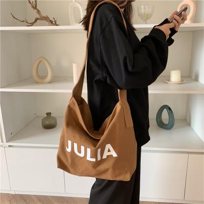 China Custom Canvas Handbag LOGO Canvas Bags For Women With Simple Letters Straps Off Shopping Bags For Students for sale