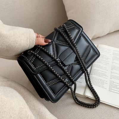 China Vintage PU Leather Cross - Body Bags Vintage PU Leather Cross - Body Bags For Women Luxury Shoulder Bags With Gun Black Rivet Lady Travel Totes fire for sale