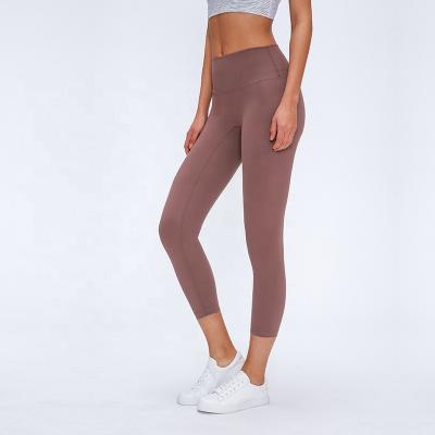 China Front Seam Line Butt Lift Non Breathable Soft Material Women Gaiters Yoga Capri Pants for sale