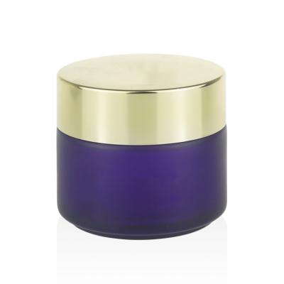 China Logo Skin Care Cosmetic Packaging 20g 30g 50g 100g Embossed Screen Printing 2oz Purple Cosmetic Glass Cream Jars With Gold Lid for sale