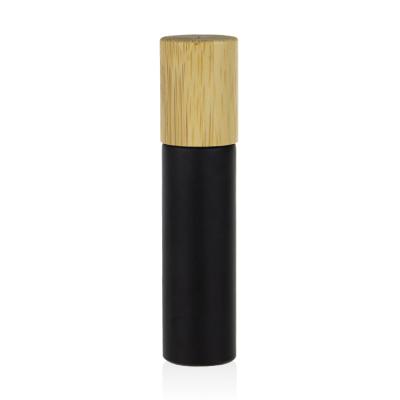 China Bamboo Matte Black Glass Packaging 5ml 10ml 15ml Essential Oil Cosmetic Eco-Friendly Bottle Roll On Bottle With Wooden Lid for sale