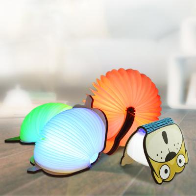 China Change Colors Cute Animal Book Light Exquisite Gift For Children Night Light Animal Folding Book Light Lamp for sale