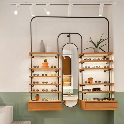 China Unique Retail Store Wooden Eye Glass Display Rack Wall Display Optician Store Glasses Display Showcase for sale