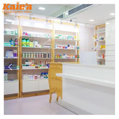 China Modern Wooden Glass Pharmacy Shop Display Rack Pharmacy Store Medical Display Racks For Tissues for sale