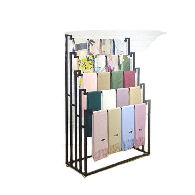 China Custom Freestanding Fashion Retail Store Metal Carpet Display Stand / Rack Display / Carpet Carpet Display for sale