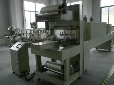 China Automatic PET Bottle Shrink Packing Machine for Mineral Water , Fruit Juice , Liquor Production for sale