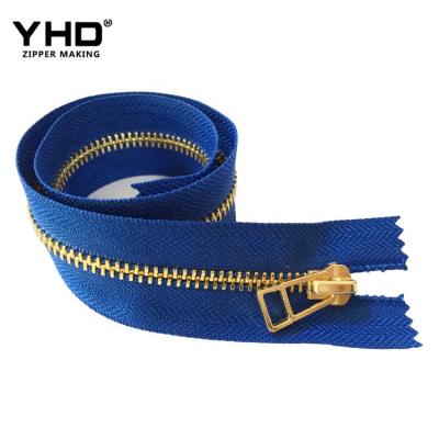 China Shiny End Metal 5# Gold Teeth Garment Zipper Eco - Friendly Sustainable End for sale