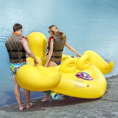 China Customized 2 Rider Swimming Pool PVC Motorized Inflatable Yellow Duck Float Toys for sale