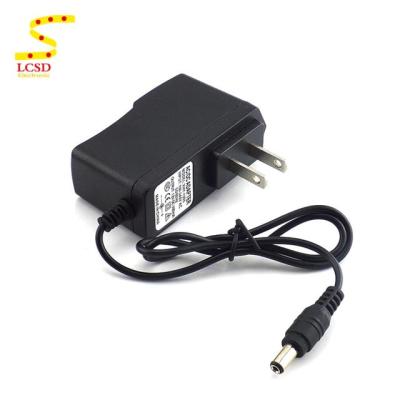 China DC 12V 1A Power Adapter US EU Wall Plug AC Adapter Power Supply LC-12V1A for sale