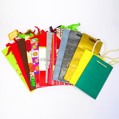 China Soft Personalized Paper Bag Christmas Kraft Paper Storage Bag Paper Craft Bag for sale