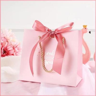 China Recycled materials wholesale luxury small size custom logo printing gift bag with handles for sale