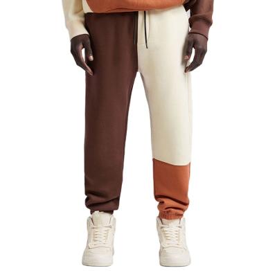 China oem jogger style pants customized parride men color block pants with drawstring mens jogger pants for sale