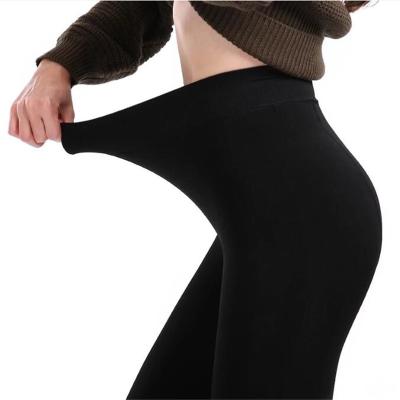 China Breathable Winter Keep Warm Women Leggings Solid Color Velvet Sexy High Waist Thicken 200g Fleece Gaiters for sale