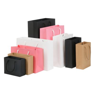 China Recyclable Custom Paper Bags Square Bottom Paper Gift Bag Kraft Paper Bag Custom Paper Bag With Handle for sale