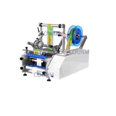 China Semi automatic round bottle self adhesive label date printing and labeling machine is suitable for cans and beverage bottles for sale