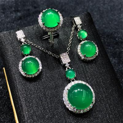 China New Design Environmental Friendly Luxury Inlaid Green Jade Ring Earrings Necklace Set Classic Ice Agate Green Chalcedony For Women for sale