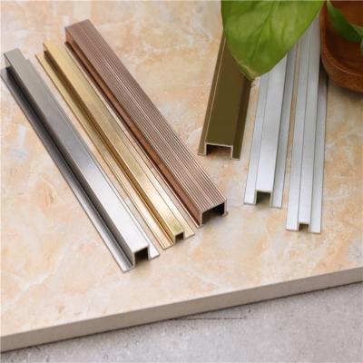 China Modern Aluminum Niu Yuan Wall Connection Trim Ceramic Profile Tile Trim for sale