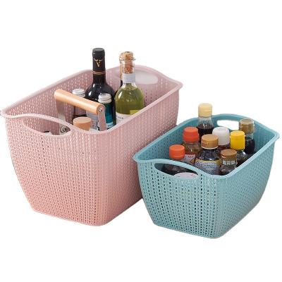 China Viable Tabletop Kitchen Storage Basket Bathroom Bathroom Rattan Storage Basket Portable Sundries for sale