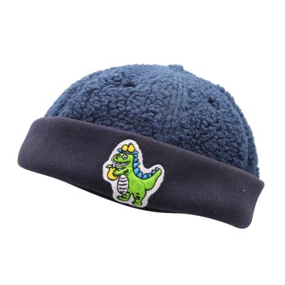 China JOINT Wholesale Custom Woven Label Logo 6 Panel Winter Brimless Hat With Cuff for sale