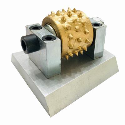 China Asian Marble Manufacturer Frankfurt Diamond Alloy Bush Hammer Roller for Floor Lychee Effect Stone Surface for sale