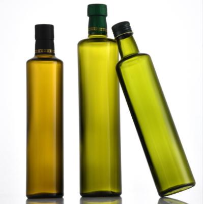 China Body Material Glass Olive Oil Bottle Dark Green Round Oil Glass Bottle with Metal Lid for sale