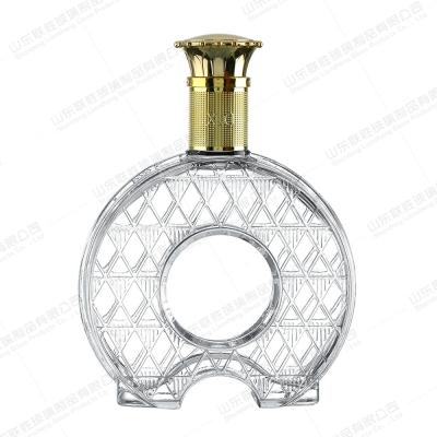 China Base de vidrio redonda estilo de moneda de cobre fondo whisky botella de vodka 100ml 250ml 500ml 750ml en venta