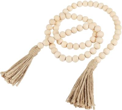 China Farmhouse Boho Decor Prayer Beads Regular Wooden Bead Garland with Tassels for sale