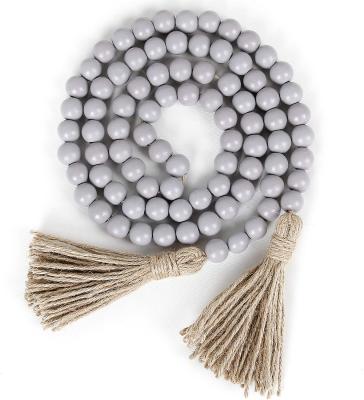 China Regular Farmhouse Beads Rustic Country Wooden Bead Garland with Tassels for sale