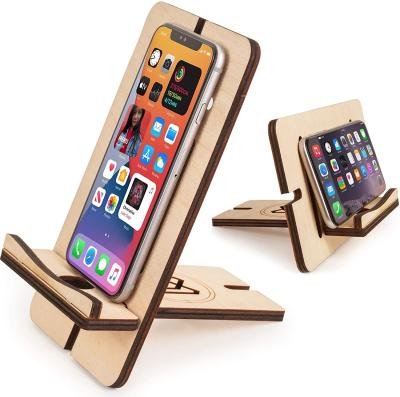 China Cool Phone Dock Desk Flip Cell Phone Tablet Adjustable Foldable Wooden Filling Stand for sale