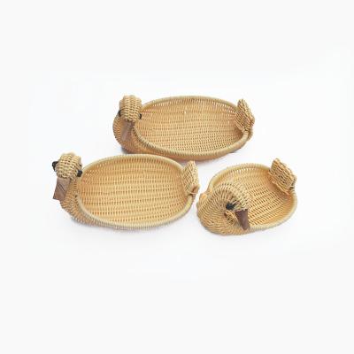 China Duck Shaped Cheap Handmade Rattan Woven Storage Animal Basket Viable Loess Storage Basket for sale