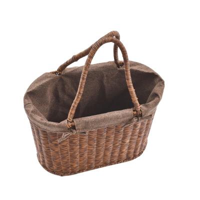 China Sustainable rattan shopping basket. Handwoven basket with handle. Large capacity shopping basket with inner fabric bag for sale