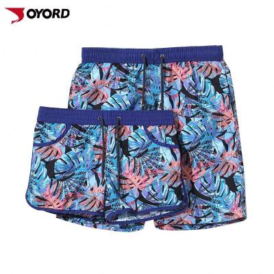 China Custom Sublimation Swimwear Quick Dry Breathable Swimwear Anti-UV Couples Beach Wear Pants for sale