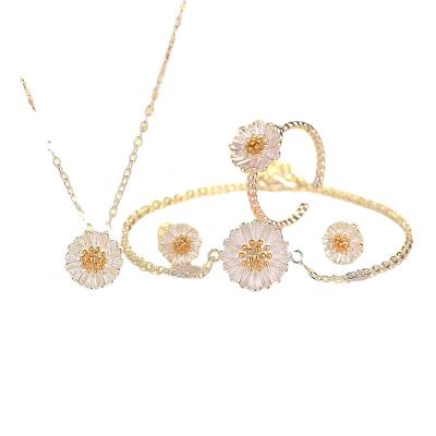 China 2022 FASHIONABLE Planner Body Jewelry 18k Gold Plated Fashion Necklace Bracelet Earrings Ring Zircon Brass Daisy Jewelry Pendant Set for sale