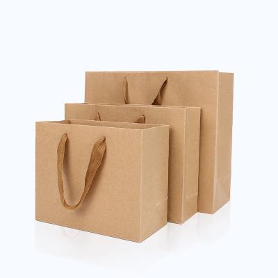 China Low MOQ Matte Black Card Paper Gift Recyclable Custom Paper Bag Kraft Paper Bag Apparel Shopping Bag With Ribbon Handle for sale