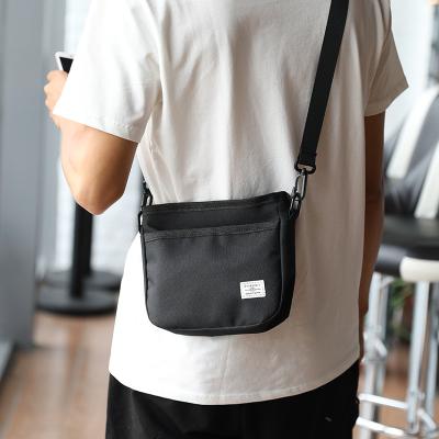 China New Shoulder Bag Men's Fashion Cross-body Fabric Outdoor Leisure Bag Waterproof Mini Bag Single Pack for sale